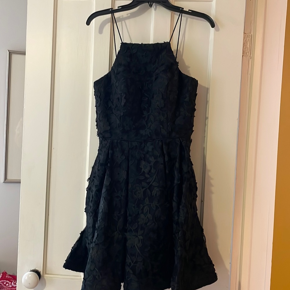 Like new black Aqua dress with floral details